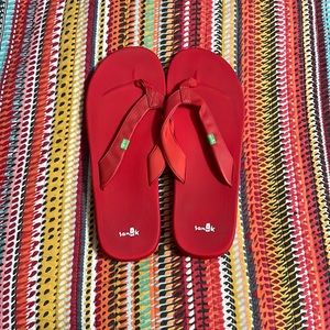 Sanuk flip flops all red. Great condition  women’s size 9